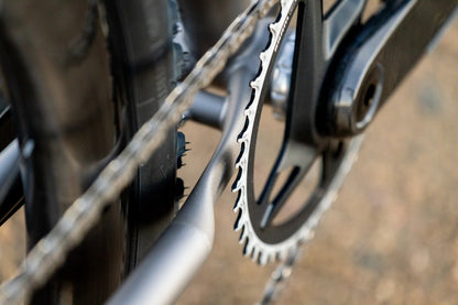1x chainring and titanium frame detail on the Moots Routt gravel bike
