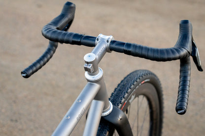 Moots Routt cockpit with flared gravel drop bars and titanium stem