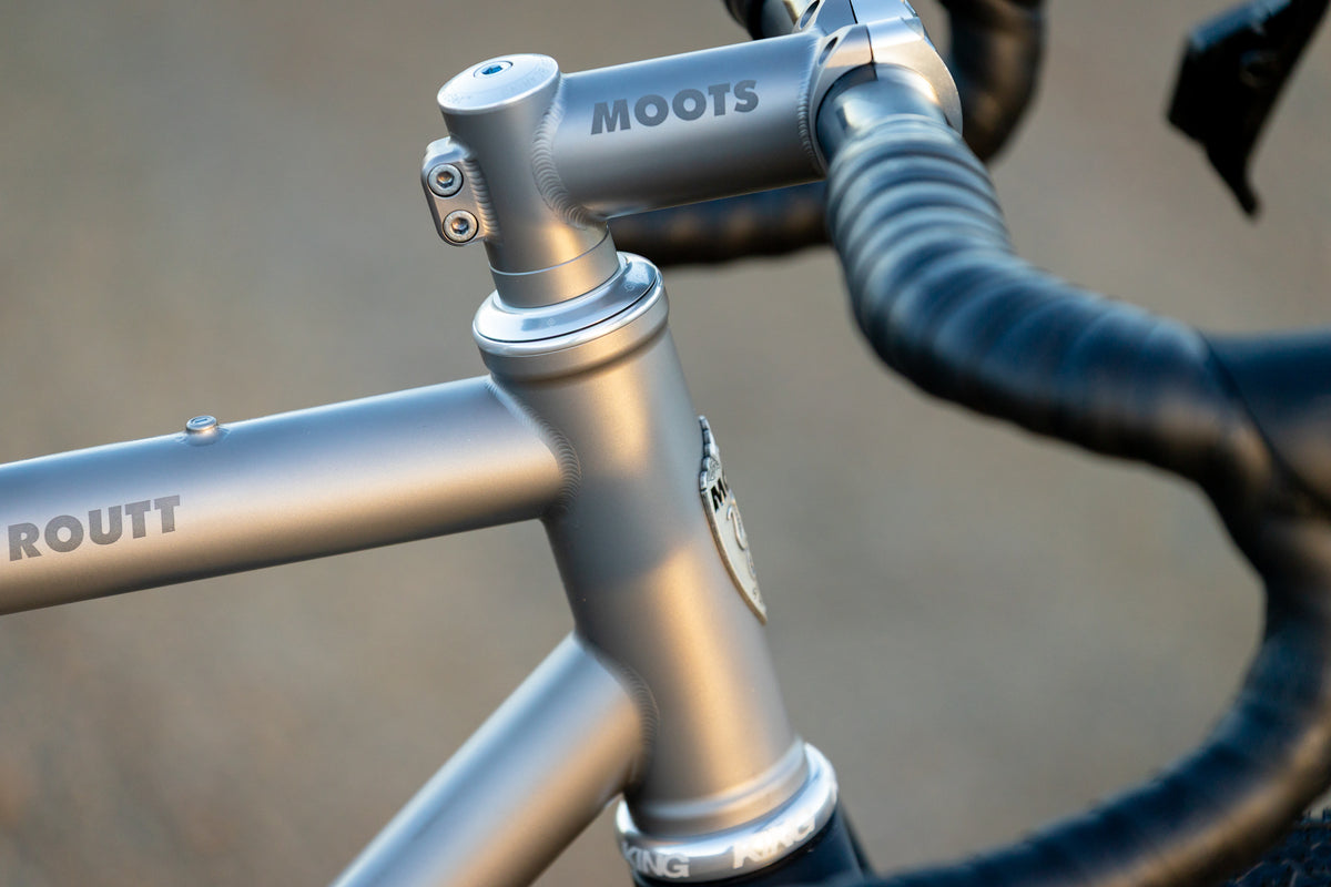 Moots Routt titanium head tube and Ti stem with integrated brake routing