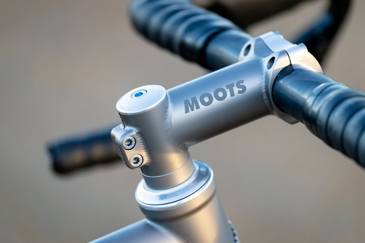 Moots titanium stem with laser-etched logo on the Routt gravel bike